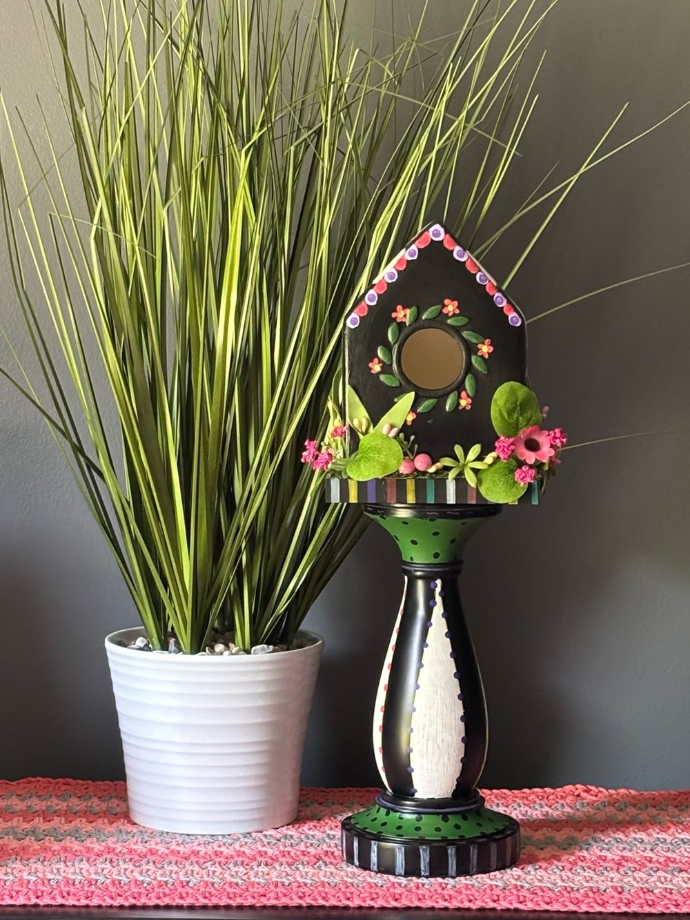 Whimsical hand painted birdhouse on pedestal